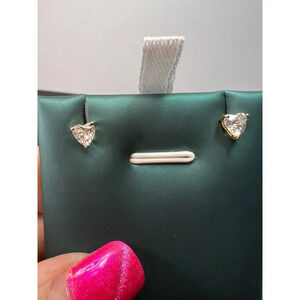 Heart shaped CZ stud earrings in sterling silver